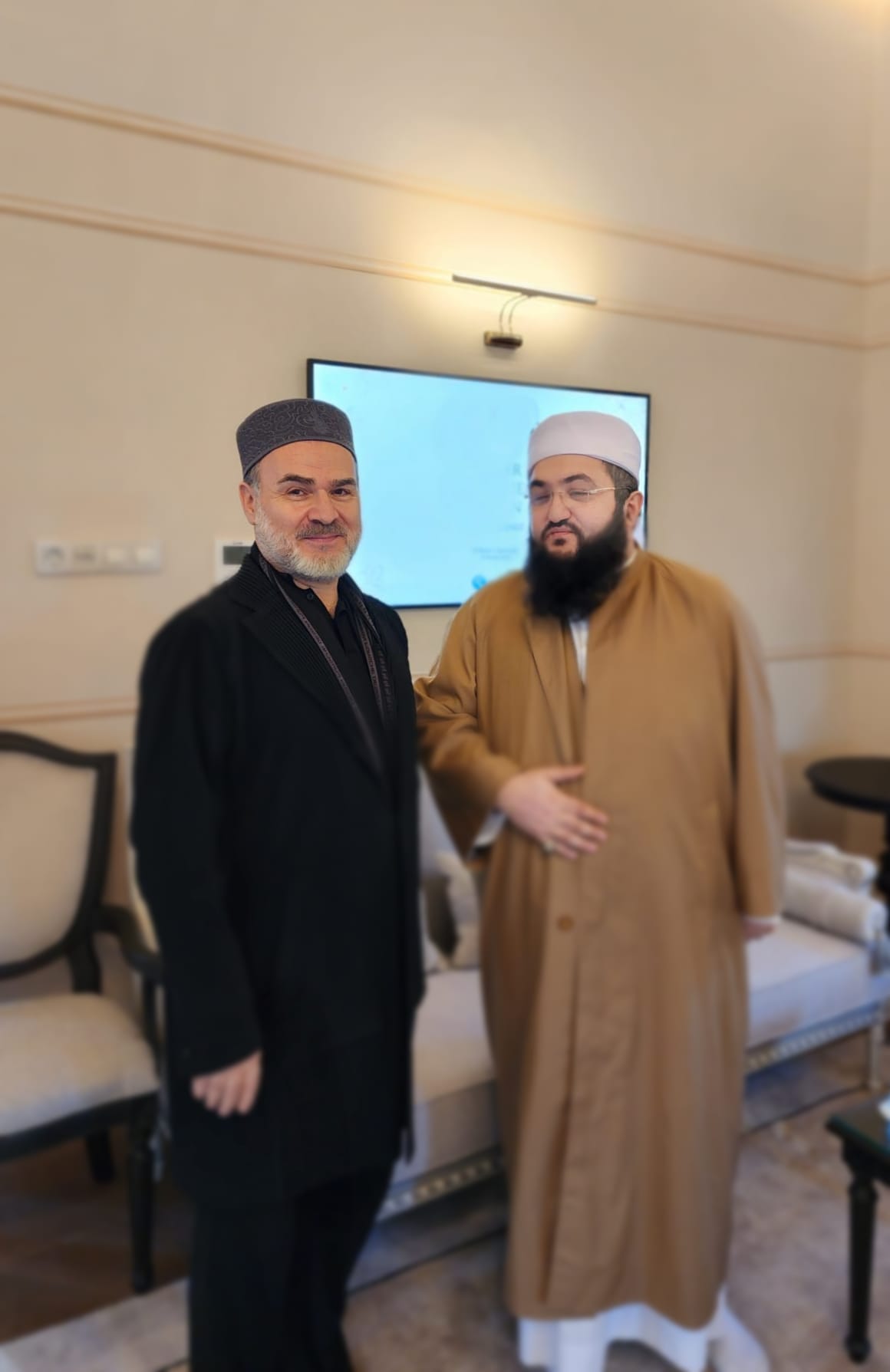 Zâhid Kotku Hazretlerinin torunu, Esad Coşan Efendinin mahdumu Nureddin Coşan Efendi ile.